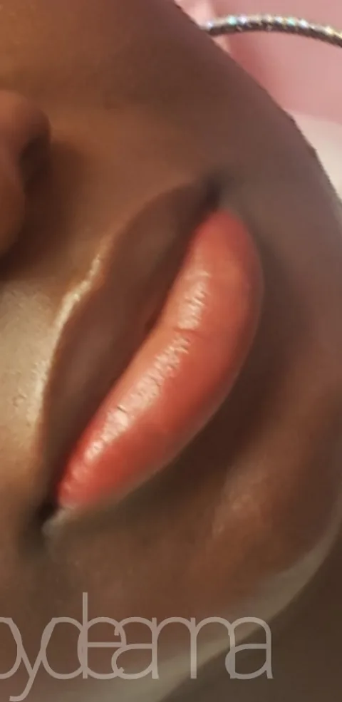 Lip blush before and after on deep skin tone: after